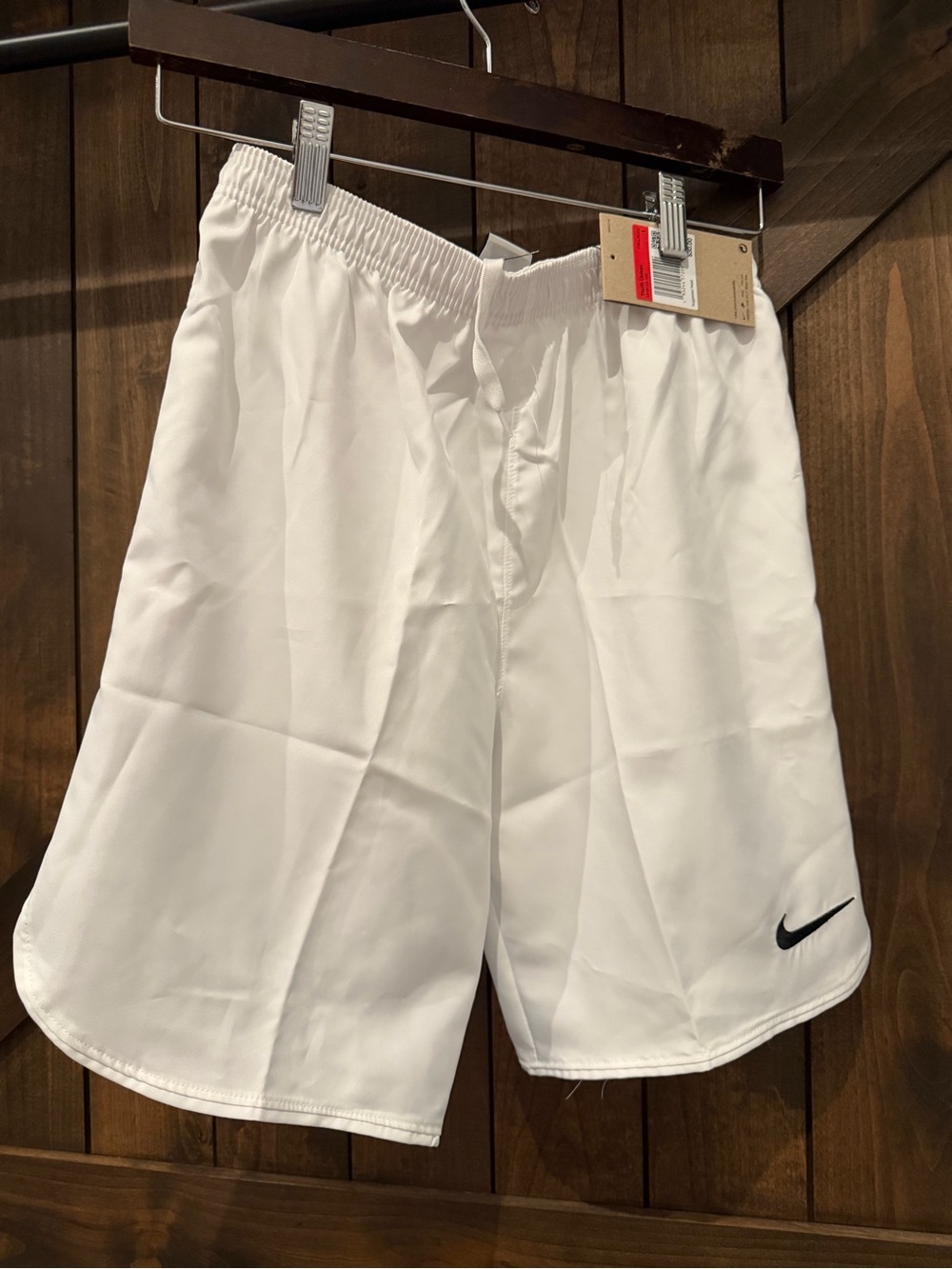 Nike Youth Unisex White Performance Shorts with Black Swoosh